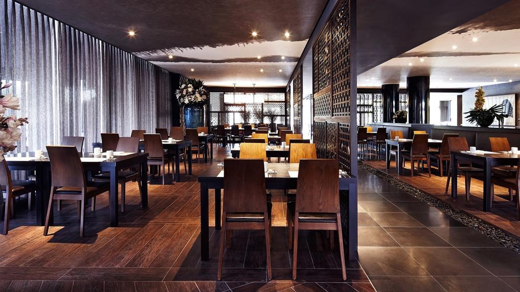 Kensington Jeju Hotel Buitenkant foto The interior of the restaurant