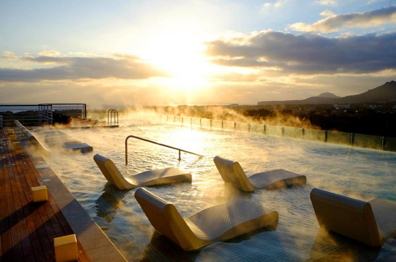 Kensington Jeju Hotel Buitenkant foto Skyline Paradise